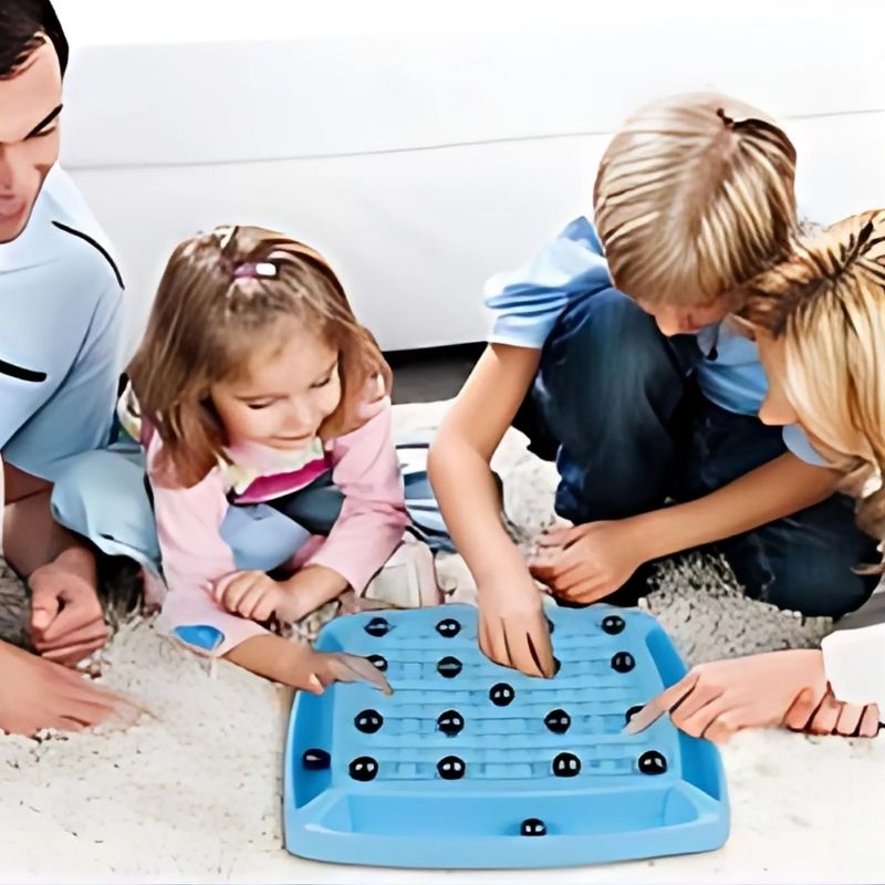 une-famille-heureuse-joue-aux-échecs-sur-le-tapis