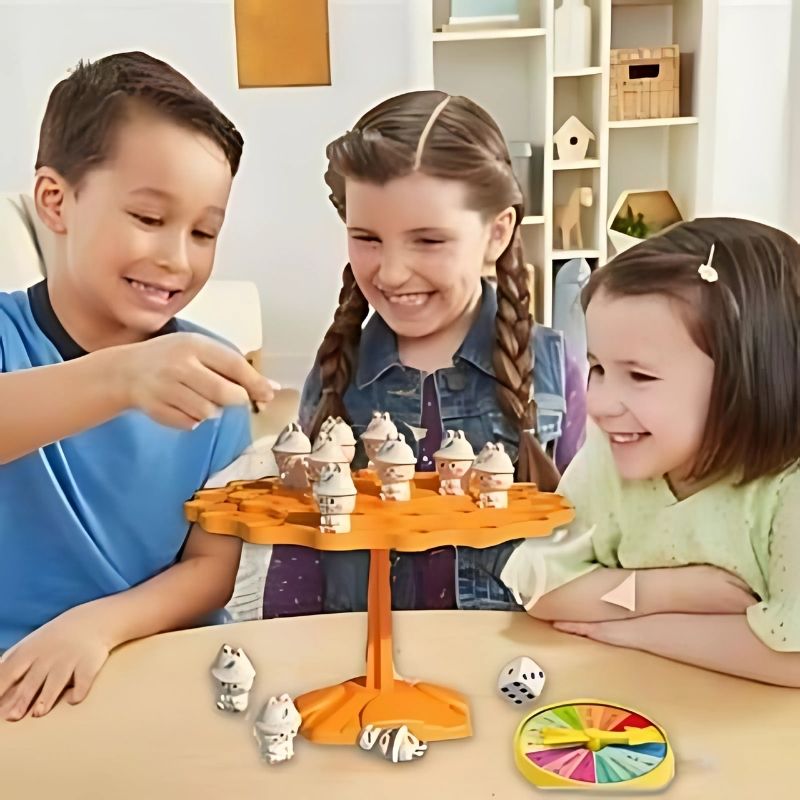 des-enfants-jouent-ensemble-à-un-jeu-d'équilibre-orange