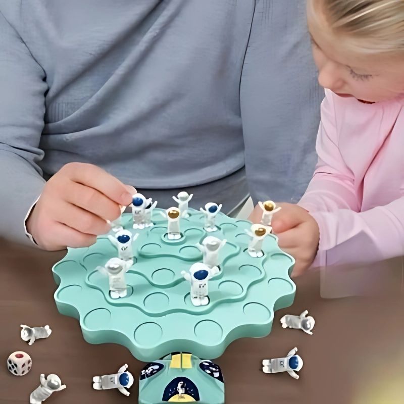 un-père-et-sa-fille-joue-à-un-jeu-de-table