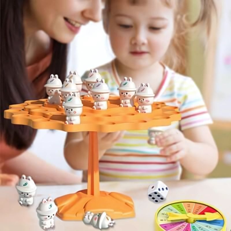 une-fillette-et-sa-maman-jouent-à-la-table-à-manger