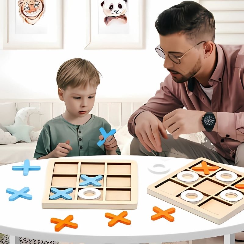 papa-et-son-fils-jouent-à-la-table-du-salon