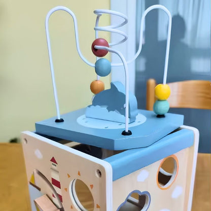 cube d'éveil bébé tiges et billes de bois pour motricité fine