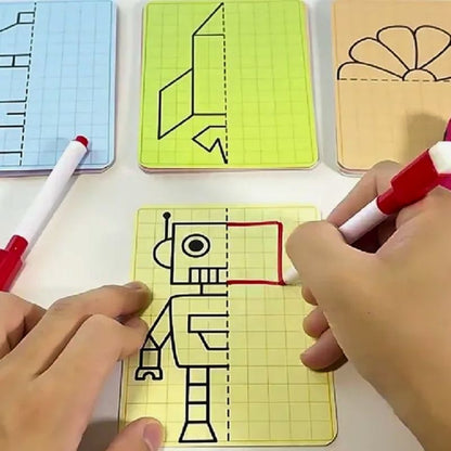dessin facile enfant dessine un robot sur feuille jaune