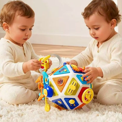 jouet bébé 1 an des jumeaux s'amuse avec une balle sensorielle