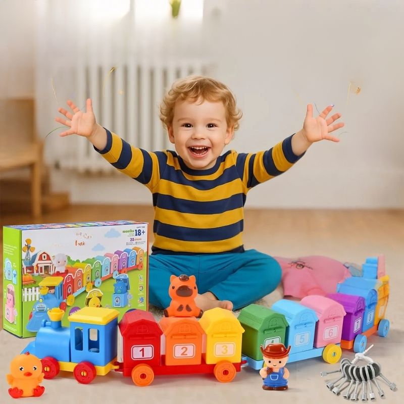 jouet bébé 1 an garçon heureux avec son train à wagons