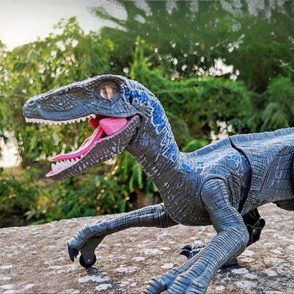 jouet dinosaure bleu réaliste lumière intégré roulette pattes coussinées
