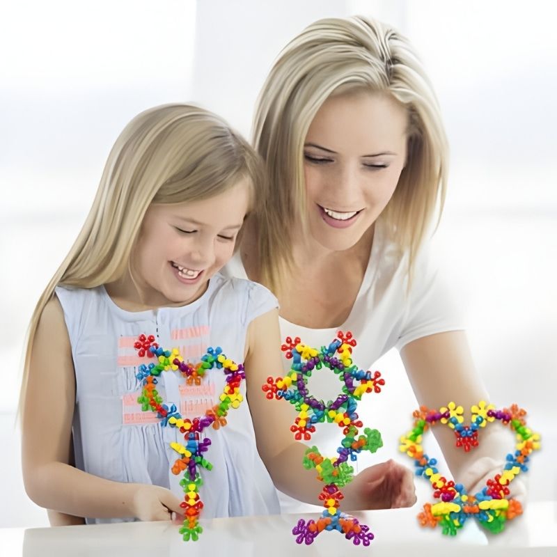 maman fillette fières des fabrications faite avec jeu de construction
