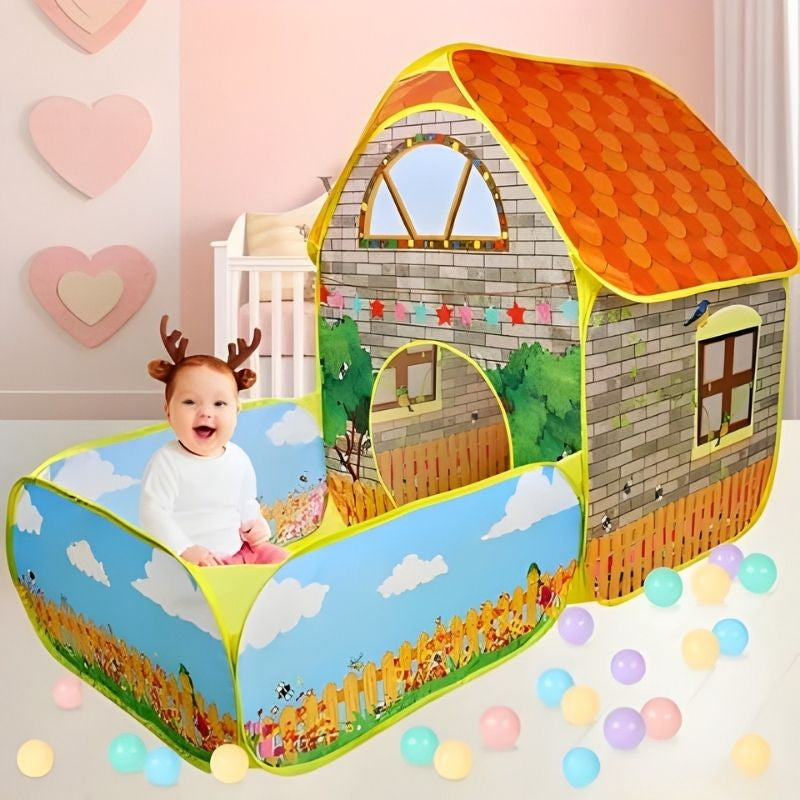 piscine a balle bebe fille joyeuse dans sa tente de jeu