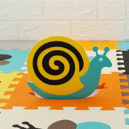 tuile-de-tapis-en-mousse-en-forme-d'escargot-coloré